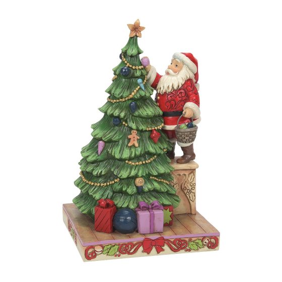 Babbo Natale decora l'albero